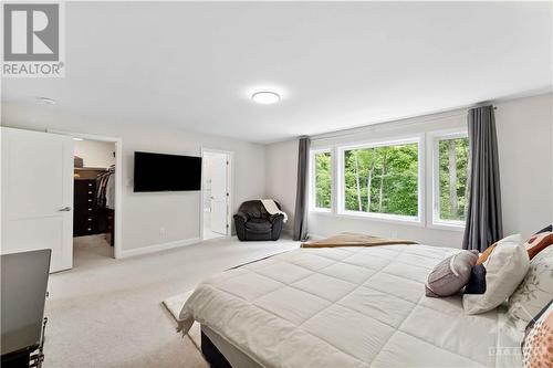 Master features walk in closet and a beautiful ensuite - 820 Mercier Crescent, Ottawa, ON - Indoor Photo Showing Bedroom