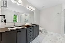 Spacious ensuite with double sink vanities - 