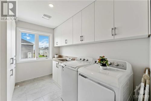 Laundry is easily accessible on the second floor - 820 Mercier Crescent, Ottawa, ON - Indoor Photo Showing Laundry Room