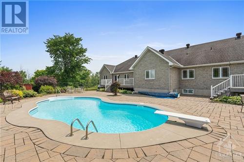 5940 Brophy Drive, Richmond, ON - Outdoor With In Ground Pool