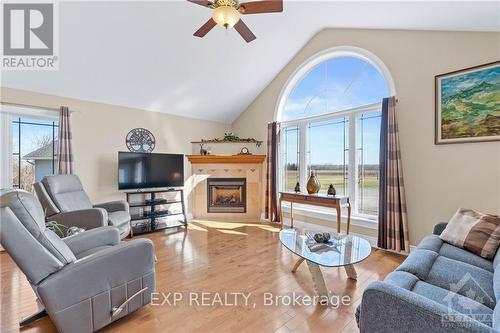 5940 Brophy Drive, Ottawa, ON - Indoor Photo Showing Living Room With Fireplace