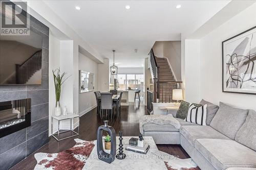 61 - 295 Royalton Common Drive, Oakville, ON - Indoor Photo Showing Living Room With Fireplace