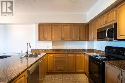 502 - 47 Caroline Street N, Hamilton, ON - Indoor Photo Showing Kitchen With Double Sink