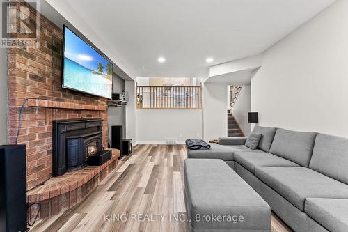 11 Daimler Drive, Kitchener, ON - Indoor Photo Showing Living Room With Fireplace