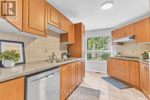 64 - 2550 Thomas Street, Mississauga, ON - Indoor Photo Showing Kitchen With Double Sink