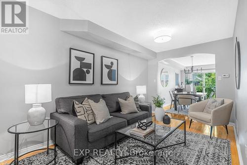 64 - 2550 Thomas Street, Mississauga, ON - Indoor Photo Showing Living Room