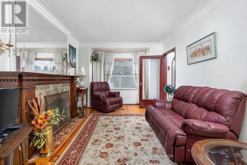 21 Hartley Avenue, Toronto, ON - Indoor Photo Showing Living Room With Fireplace