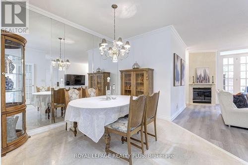 104 - 1 Ripley Avenue, Toronto, ON - Indoor Photo Showing Dining Room With Fireplace
