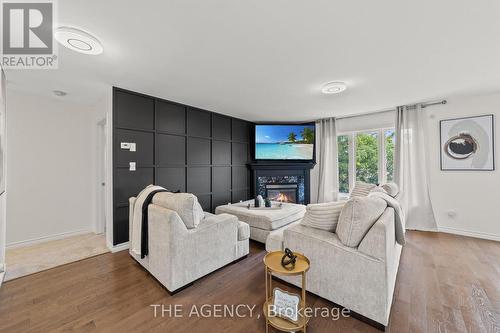 2245 Sproule Street, Innisfil, ON - Indoor Photo Showing Living Room With Fireplace