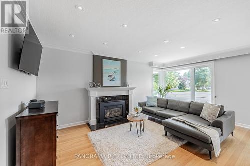 25 Alanmeade Crescent, Toronto, ON - Indoor Photo Showing Living Room With Fireplace