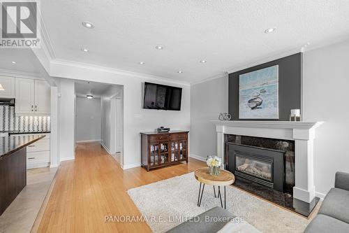 25 Alanmeade Crescent, Toronto, ON - Indoor Photo Showing Living Room With Fireplace