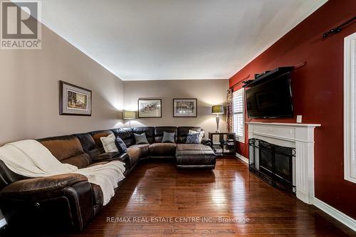 20 Windswept Trail, Brampton, ON - Indoor Photo Showing Living Room With Fireplace