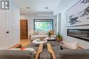 1B Ivy Avenue, Toronto, ON  - Indoor Photo Showing Living Room With Fireplace 