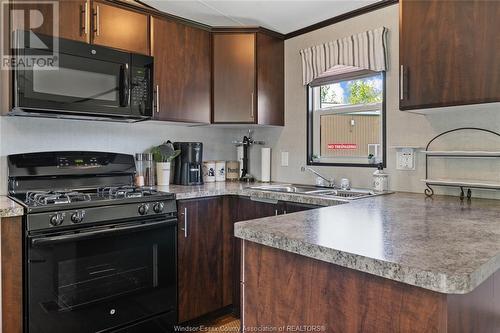 981 County Rd 2 Unit# 500, Lakeshore, ON - Indoor Photo Showing Kitchen With Double Sink