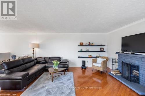 688 Westmount Hills Drive E, London, ON - Indoor Photo Showing Living Room With Fireplace