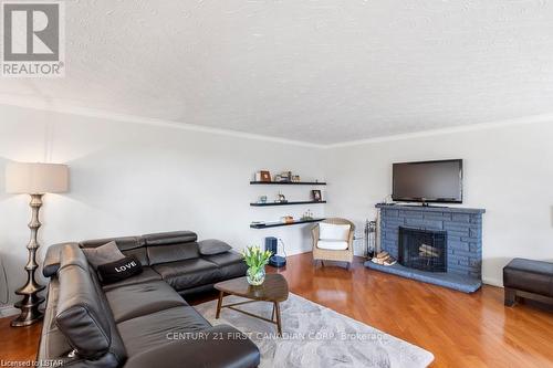 688 Westmount Hills Drive E, London, ON - Indoor Photo Showing Living Room With Fireplace