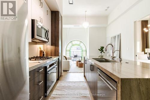 307 - 14 Dewhurst Boulevard, Toronto, ON - Indoor Photo Showing Kitchen With Upgraded Kitchen