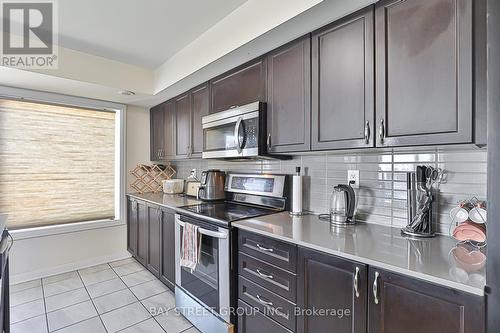 2 - 161 Frederick Tisdale Drive, Toronto, ON - Indoor Photo Showing Kitchen With Upgraded Kitchen