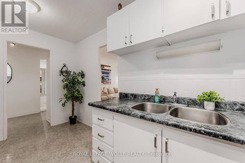 906 - 225 Harvard Place, Waterloo, ON - Indoor Photo Showing Kitchen With Double Sink