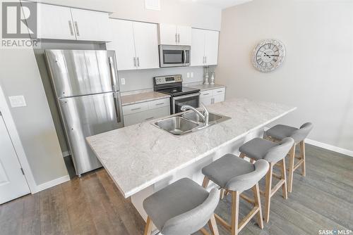 508A 3359 Green Poppy Street, Regina, SK - Indoor Photo Showing Kitchen With Double Sink With Upgraded Kitchen