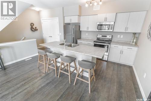 508A 3359 Green Poppy Street, Regina, SK - Indoor Photo Showing Kitchen With Upgraded Kitchen