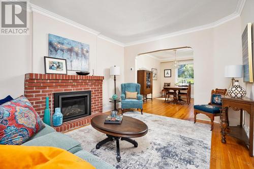 557 Beresford Avenue, Toronto, ON - Indoor Photo Showing Living Room With Fireplace