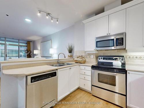 604-980 Yonge St S, Toronto, ON - Indoor Photo Showing Kitchen With Double Sink