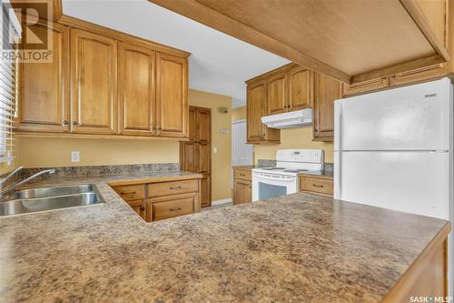 120 Burke Crescent, Swift Current, SK - Indoor Photo Showing Kitchen With Double Sink
