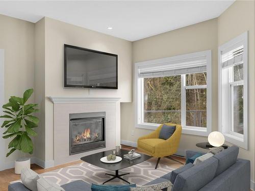 404-1838 Cowichan Bay Rd, Cowichan Bay, BC - Indoor Photo Showing Living Room With Fireplace