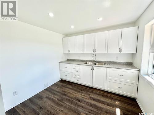 754 6Th Street E, Prince Albert, SK - Indoor Photo Showing Kitchen With Double Sink