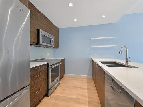 204-300 Belmont Rd, Colwood, BC - Indoor Photo Showing Kitchen With Stainless Steel Kitchen With Double Sink