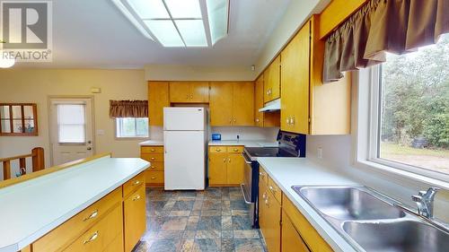 13084 Firehall Road, Charlie Lake, BC - Indoor Photo Showing Kitchen With Double Sink