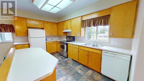 13084 Firehall Road, Charlie Lake, BC - Indoor Photo Showing Kitchen With Double Sink