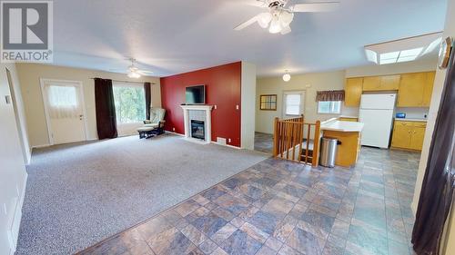 13084 Firehall Road, Charlie Lake, BC - Indoor With Fireplace