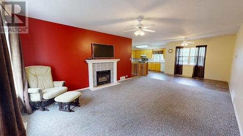 13084 Firehall Road, Charlie Lake, BC - Indoor Photo Showing Living Room With Fireplace