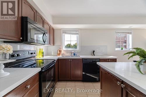 11 - 51 Hays Boulevard, Oakville, ON - Indoor Photo Showing Kitchen With Double Sink