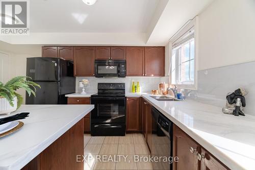 11 - 51 Hays Boulevard, Oakville, ON - Indoor Photo Showing Kitchen With Double Sink