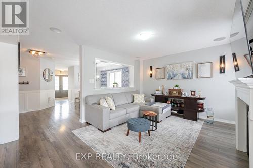 8769 Dogwood Crescent, Niagara Falls, ON - Indoor Photo Showing Living Room With Fireplace