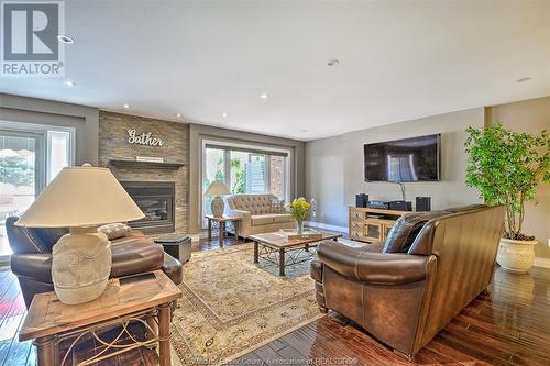 63 Fairway Crescent Unit# 2, Amherstburg, ON - Indoor Photo Showing Living Room With Fireplace