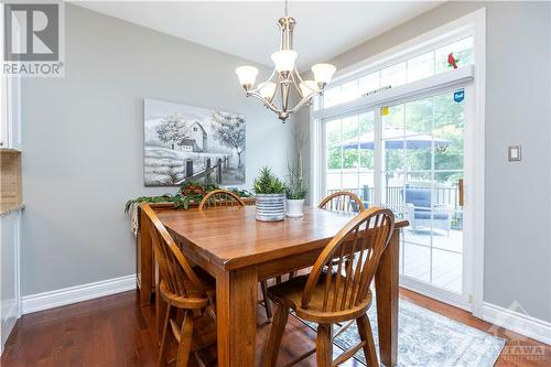 Eat-in space provides direct access to the backyard - 1854 Springridge Drive, Ottawa, ON - Indoor Photo Showing Dining Room