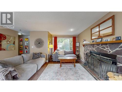 2226 Cook Street, Creston, BC - Indoor Photo Showing Living Room With Fireplace