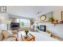 1017 12Th  S Street, Cranbrook, BC  - Indoor Photo Showing Living Room With Fireplace 