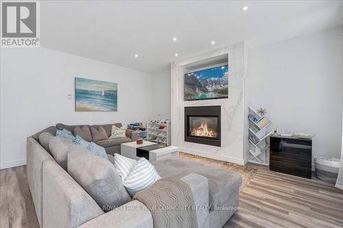 10349 Lakeshore Road W, Port Colborne, ON - Indoor Photo Showing Living Room With Fireplace