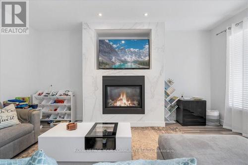 10349 Lakeshore Road W, Port Colborne, ON - Indoor Photo Showing Living Room With Fireplace