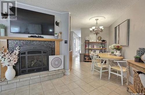 24 2338 Assiniboine Avenue, Regina, SK - Indoor Photo Showing Other Room With Fireplace