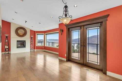 6151 Gillam Crescent, Peachland, BC - Indoor Photo Showing Other Room With Fireplace