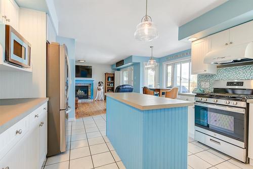 5168 Morrison Crescent, Peachland, BC - Indoor Photo Showing Kitchen With Fireplace