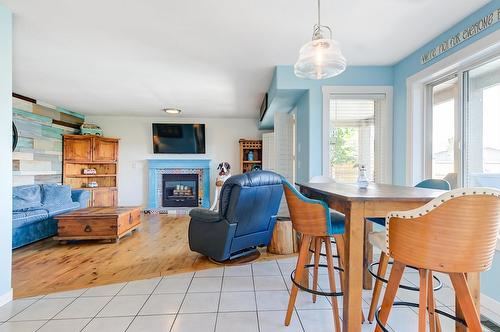 5168 Morrison Crescent, Peachland, BC - Indoor Photo Showing Dining Room With Fireplace