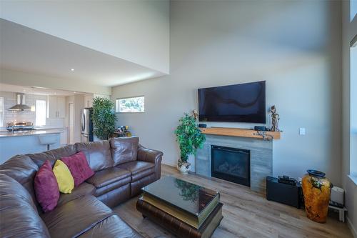 30-125 Cabernet Drive, Okanagan Falls, BC - Indoor Photo Showing Living Room With Fireplace