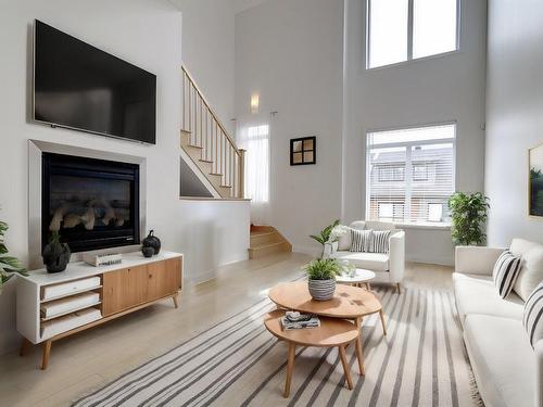 Living room - 3514 Rue Des Francs-Bourgeois, Boisbriand, QC - Indoor Photo Showing Living Room With Fireplace